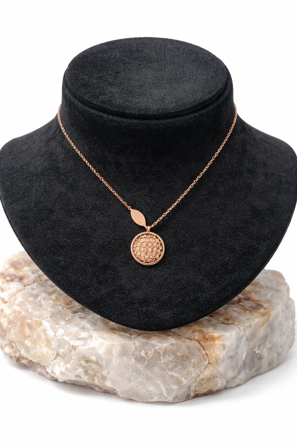 Round Disc Pendant with Stone Pattern & Leaf Accent